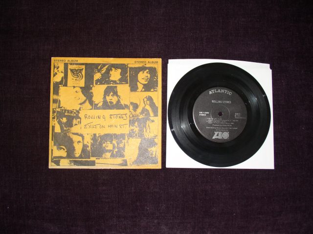 Here's my four-song jukebox (remember those?) EP that was issued only for, um, full-size and those mini pizza restaurant jukeboxes. Not available for public sale in record stores. Very rare cover and EP from my personal collection.