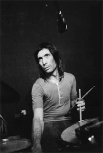 WATTS THE TUNE? Stones drummer Charlie Watts sweats to the beat in the basement at Nellcote, 1971.