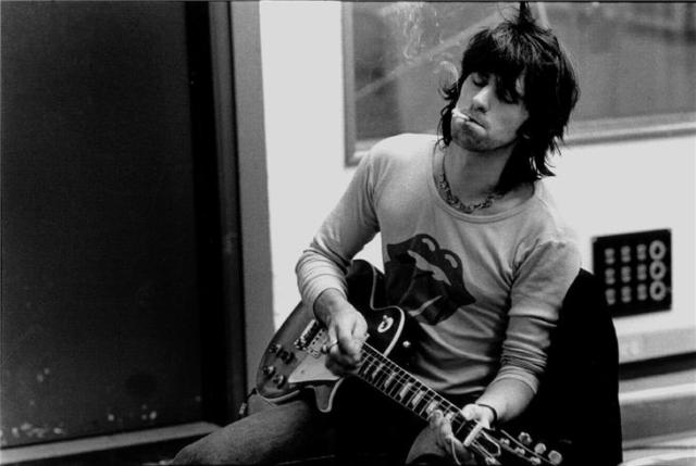 Keith Richards plays a riff during the 