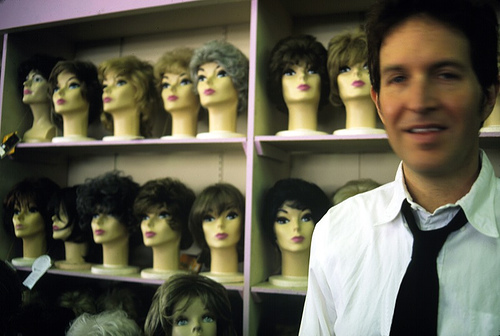 Fourteen disembodied heads are better than one. Is anyone else slightly troubled by the fact that Steve is smiling with necktie loosened, as if he's just completed something labor intensive? And is this his "den"?