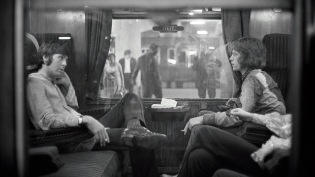 "First Class Travel": McCartney and Mick wonder who will be England's richest rock star. Photo credit: Victor Blackman/Express/Getty Images