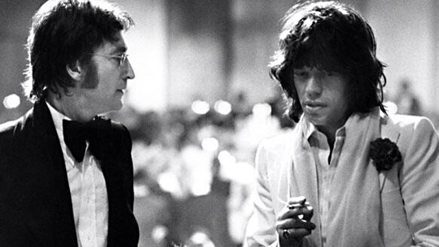 The Dirty Mac reforming? Or John and Mick strategizing the session for "Too Many Cooks" (an intended and ultimately aborted Jagger solo single that finally saw official release on a Jagger solo compilation, "The Very Best of Mick Jagger," decades after its 1973-74 recording).