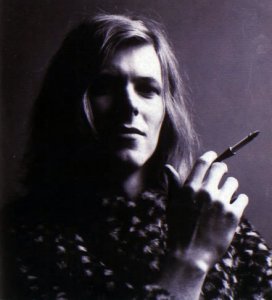 Debonair David (did we ever have any doubt?) strikes a pose circa "Hunky Dory," 1971.