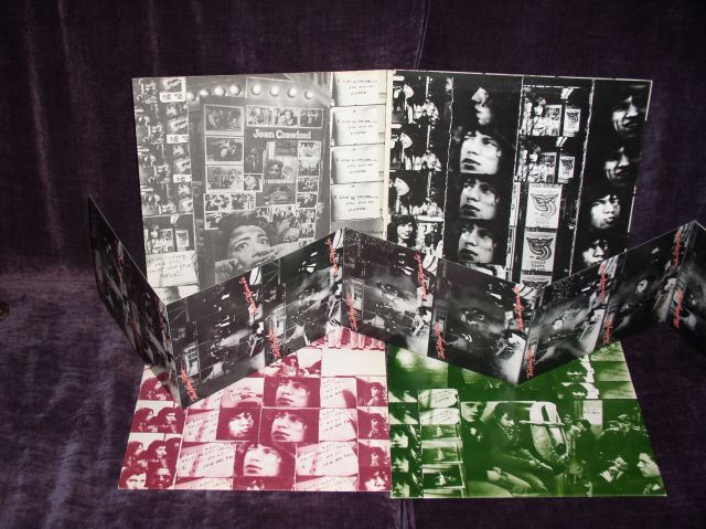 One of my original copies of "Exile" and one of the most iconic album covers of all-time, using both images shot by photographer Robert Frank for his landmark book, "The Americans," as well as new pictures of the band shot by Frank  on location in California and New York). This is a very early and possible first pressing that came in a distinct uni-pak style jacket (both LPs slid into the inside of the opened front jacket flap) and also included 12 attached/perforated postcards of the band horsing around in costume (bassist Bill Wyman didn't make the photo shoot, so someone took his place). Later pressings did not include the postcards and had standard double-LP gatefold sleeves. 